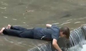 The current was strong, and even though he had managed to touch and grab her.