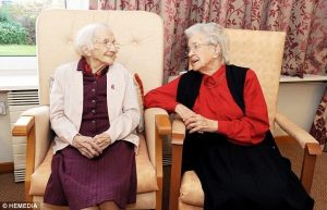 Miss Gallan (left) was raised in a simple and direct home with five sisters and one brother who shared a straw-filled mattress and went to sleep off every night.
