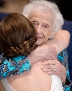 Tara quickly changed her Stella York wedding dress and staged a picture session for her Nana within the condo's clubhouse