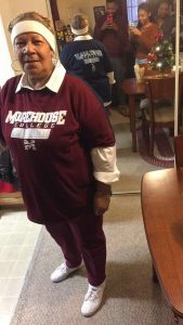 Grandma sewed the shirts from Cameron's college, Spelman, and Morehouse College together so she could celebrate her grandchildren's successes at once