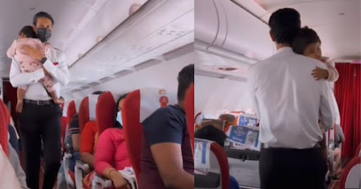 The Cabin Crew Of Air India Cradles A Baby During Flight, & It's Getting Viral On The Internet